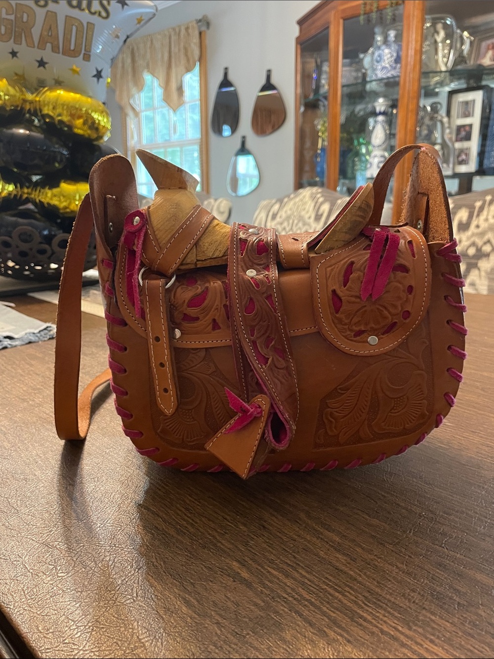 Hand-Tooled Brown Leather Crossbody with Pink Accents